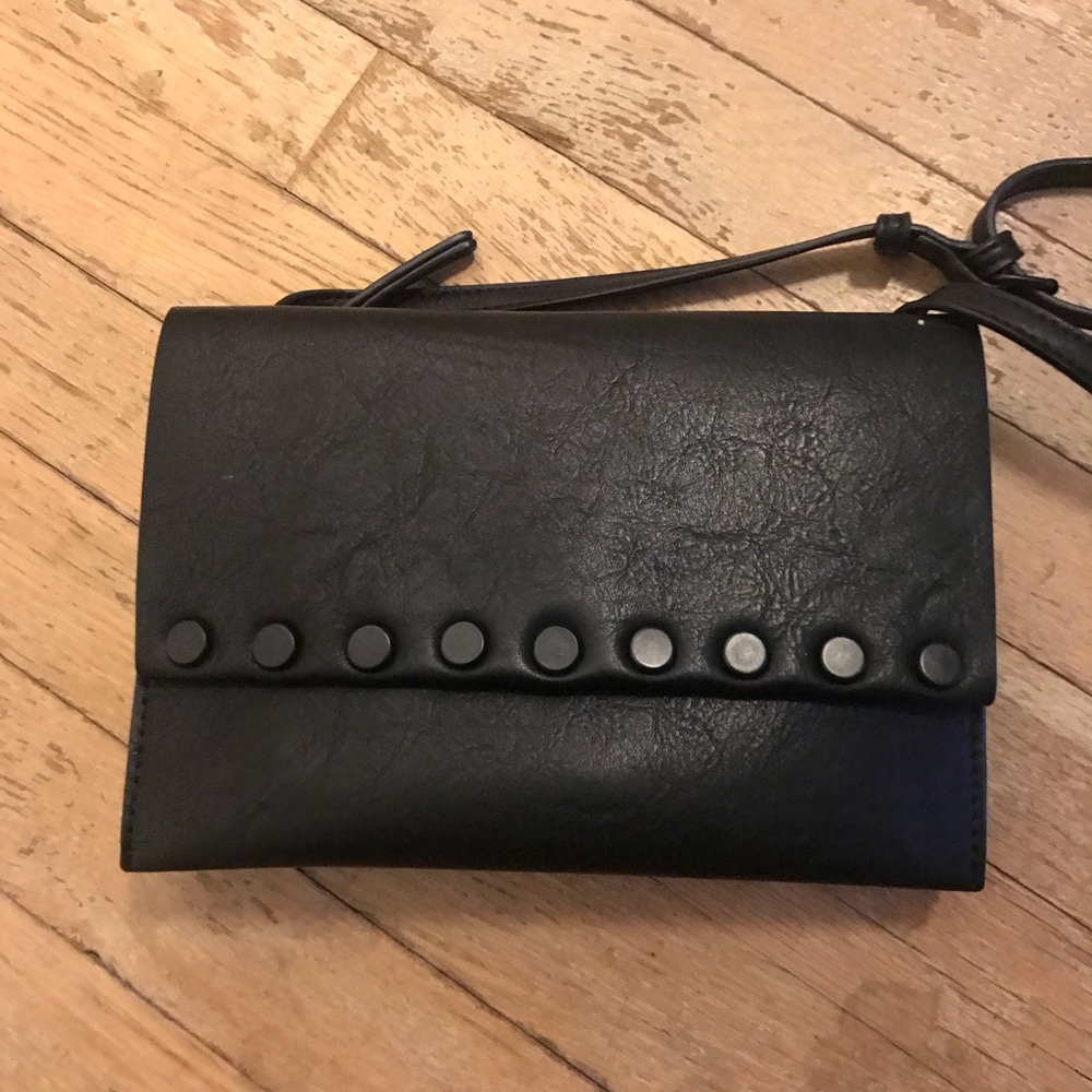 Black crossbody with studs and zipper back!